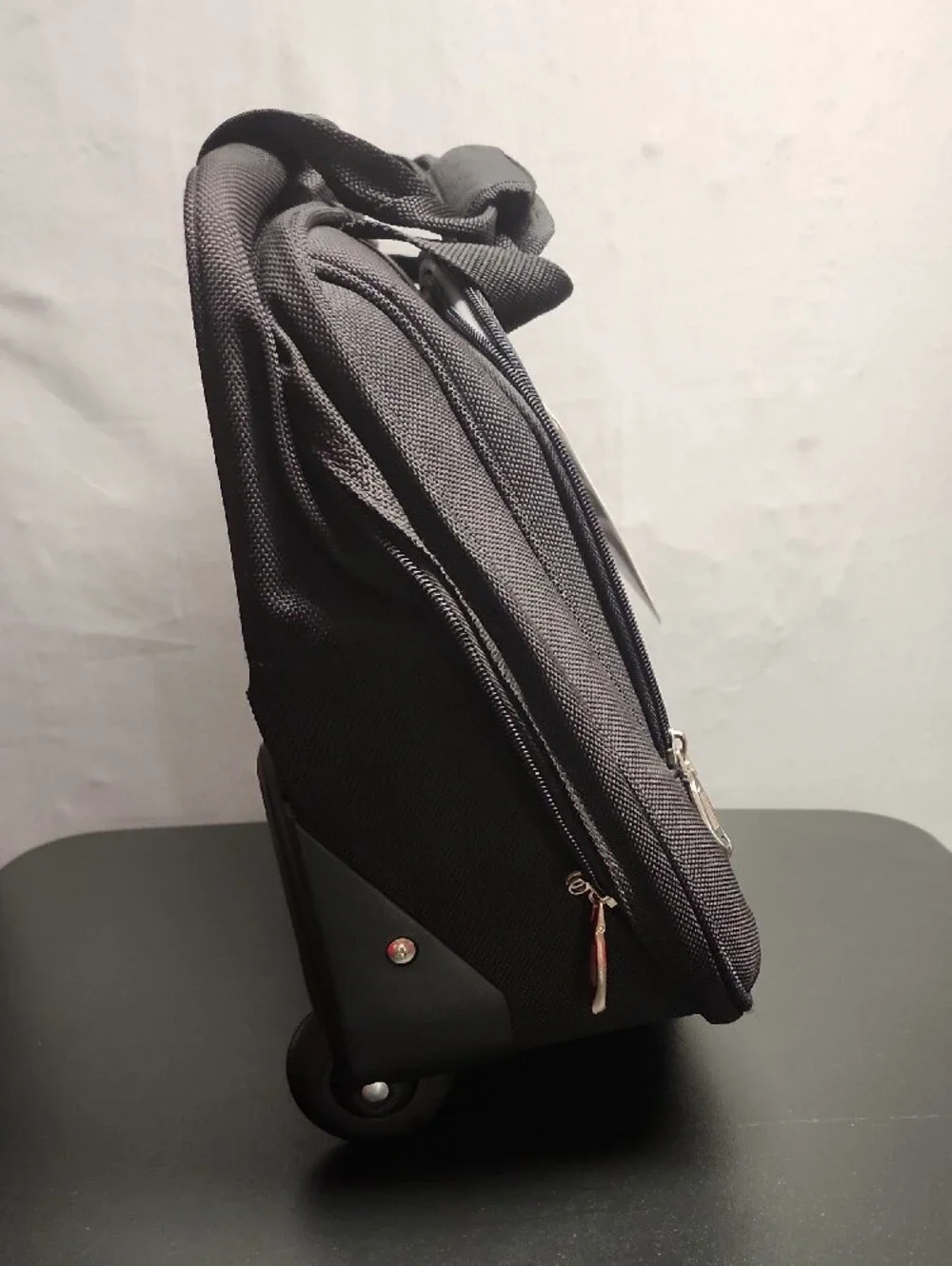 Delsey London Absoulte Black Rolling Trolly Tote